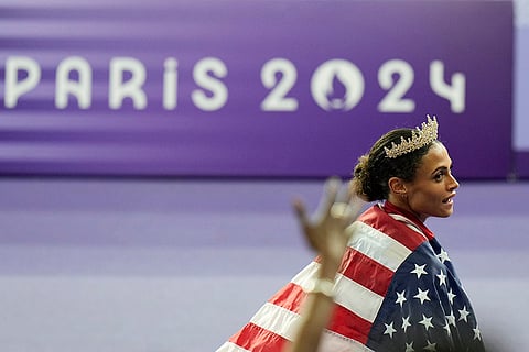 Sydney McLaughlin-Levrone celebrates wining the gold medal in the women's 400-meters hurdles final